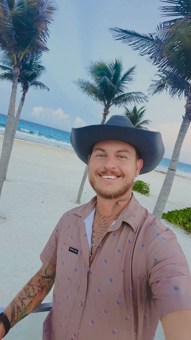Shawn on a beach