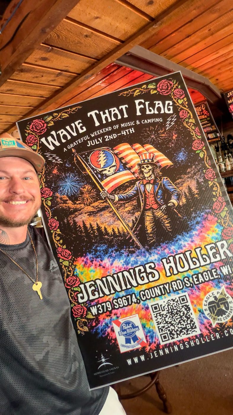 Shawn with a festival poster